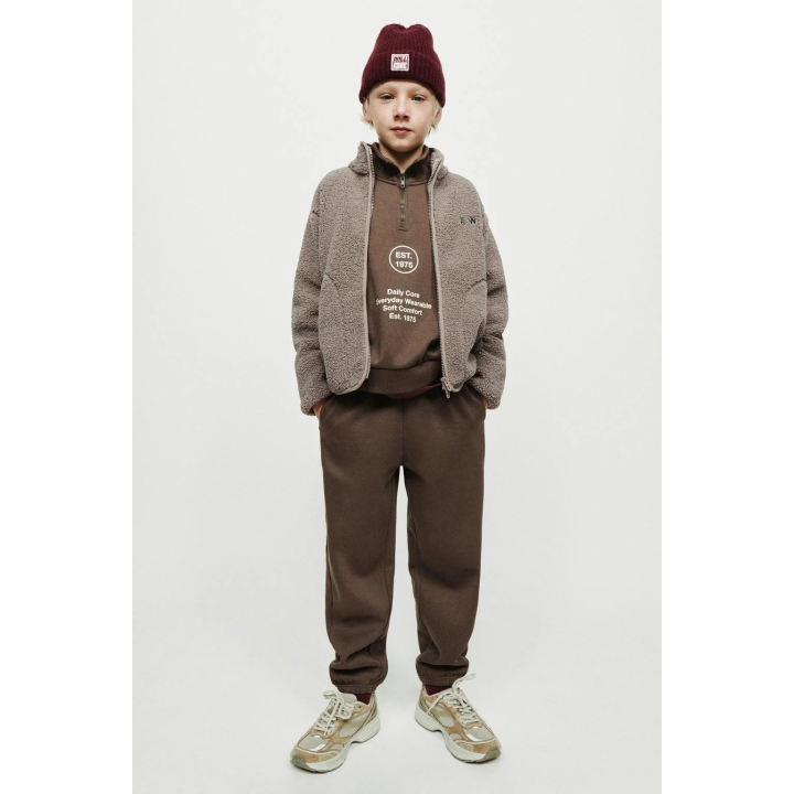 КУРТКА ИЗ ИСКУССТВЕННОЙ ОВЧИНЫ С ВЫШИВКОЙ