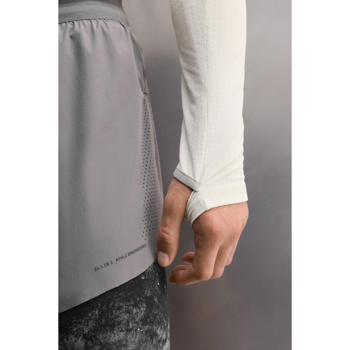 ФУТБОЛКА ИЗ ТЕХНИЧЕСКОЙ ТКАНИ С ВОРОТНИКОМ НА МОЛНИИ