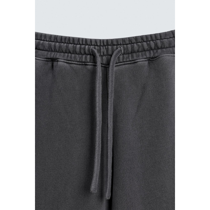 ДЖОГГЕРЫ WIDE FIT С ЭФФЕКТОМ ПОТЕРТОСТИ