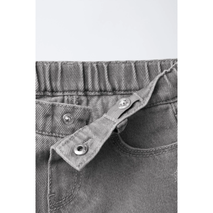 ДЖИНСЫ-КЮЛОТЫ С БОКОВЫМИ ЗВЕЗДАМИ