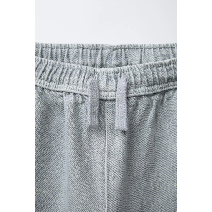 БРЮКИ-БАЛЛОНЫ ИЗ ТВИЛА С ЭФФЕКТОМ ПОСТИРАННОСТИ