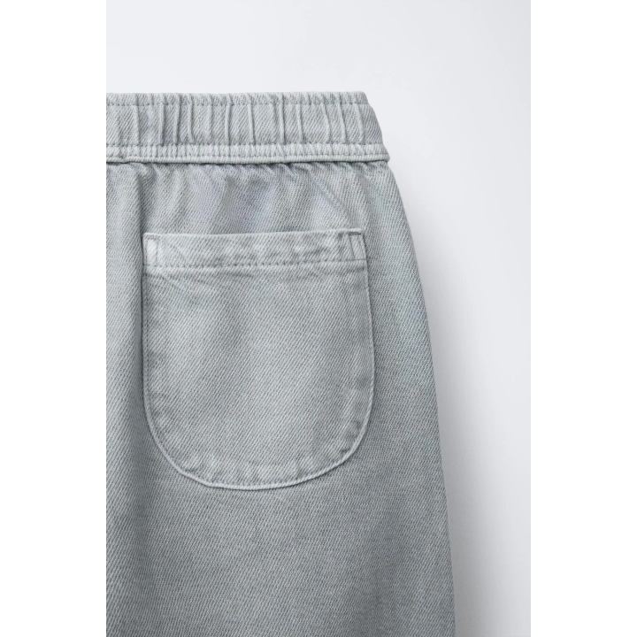 БРЮКИ-БАЛЛОНЫ ИЗ ТВИЛА С ЭФФЕКТОМ ПОСТИРАННОСТИ