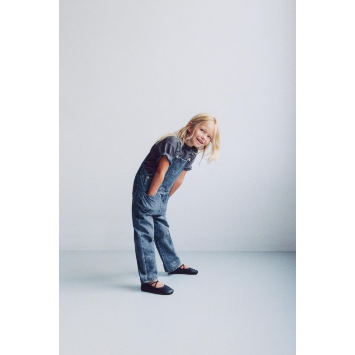 Джинсовый комбинезон с вышитыми звездами