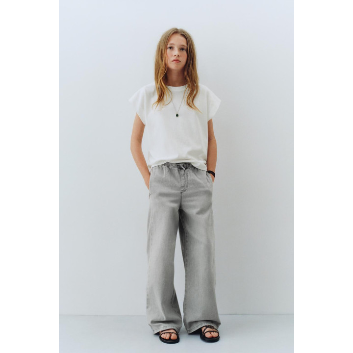 ДЖИНСЫ С ШИРОКИМИ ШТАНИНАМИ И ШНУРКАМИ