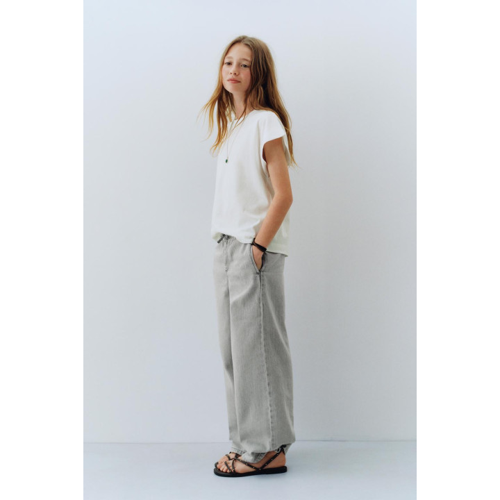 ДЖИНСЫ С ШИРОКИМИ ШТАНИНАМИ И ШНУРКАМИ