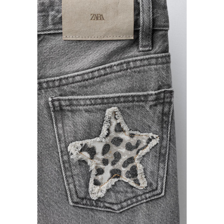 ДЖИНСЫ WIDE LEG СО ЗВЕЗДАМИ И АНИМАЛИСТИЧЕСКИМ ПРИНТОМ