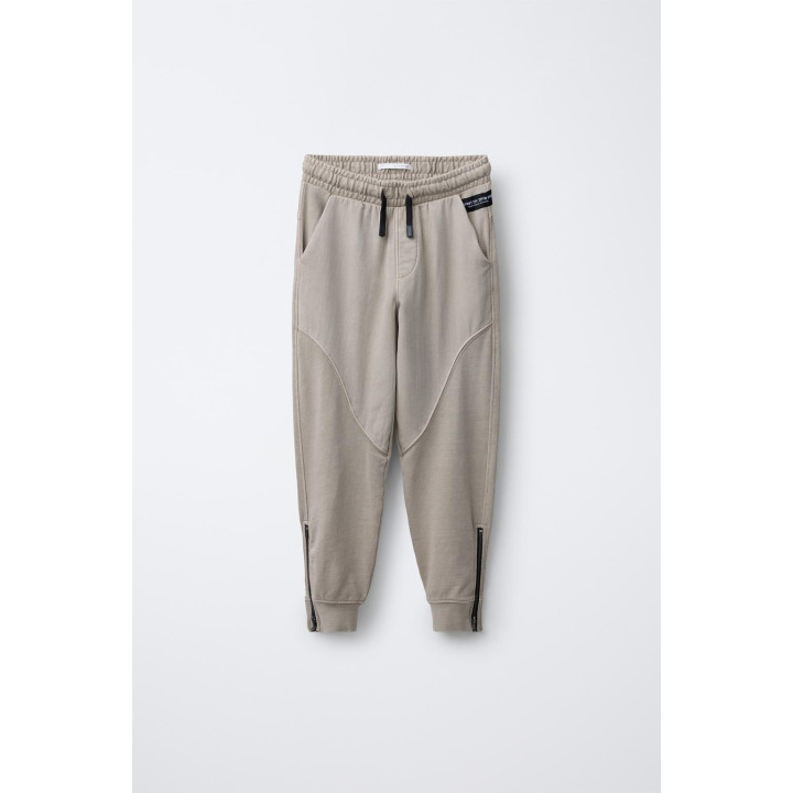 БРЮКИ-ДЖОГГЕРЫ С МОЛНИЯМИ