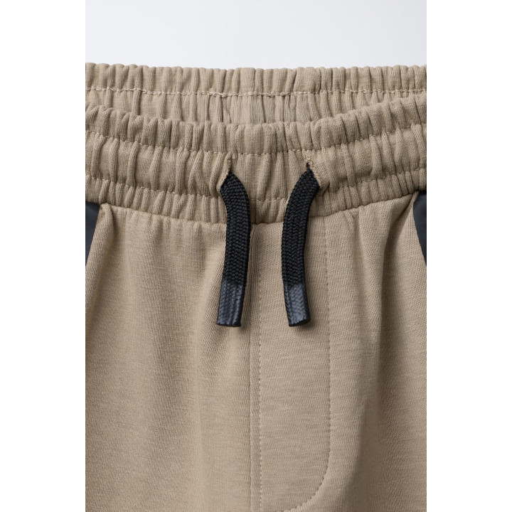 СПОРТИВНЫЕ БРЮКИ-ДЖОГГЕРЫ ИЗ INTERLOCK