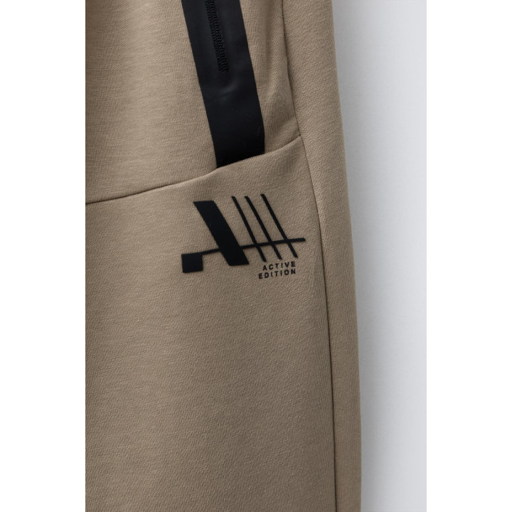 СПОРТИВНЫЕ БРЮКИ-ДЖОГГЕРЫ ИЗ INTERLOCK