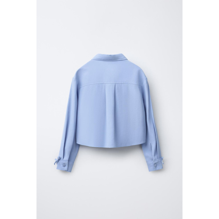 РУБАШКА СТРУЯЩЕГОСЯ КРОЯ С БАНТАМИ