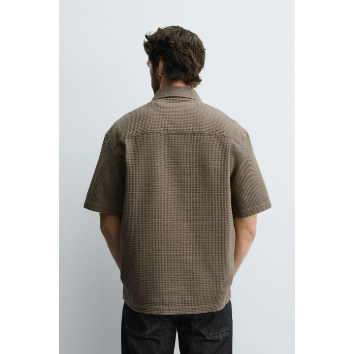 Поло с структурным узором