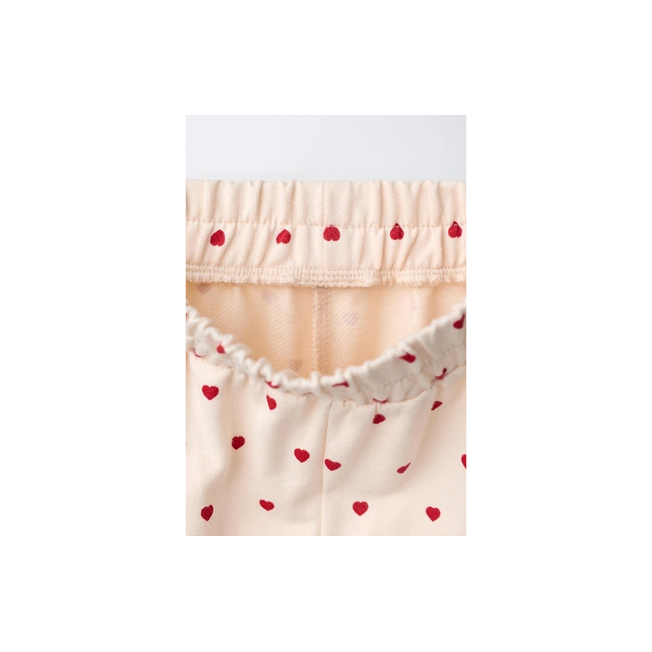 БРЮКИ С ЗАЩИПАМИ И СЕРДЕЧКАМИ