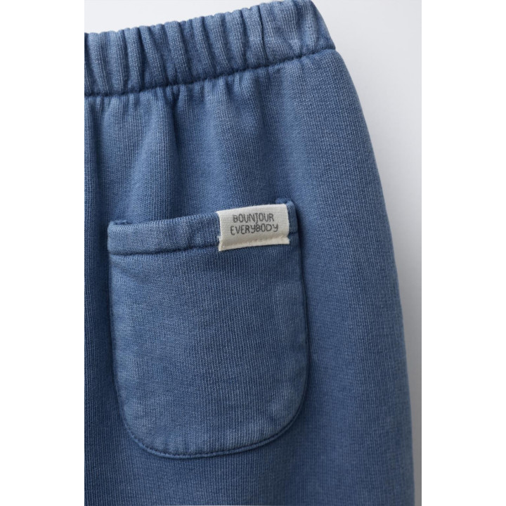 БРЮКИ-ДЖОГГЕРЫ С ЭФФЕКТОМ ПОТЕРТОСТИ