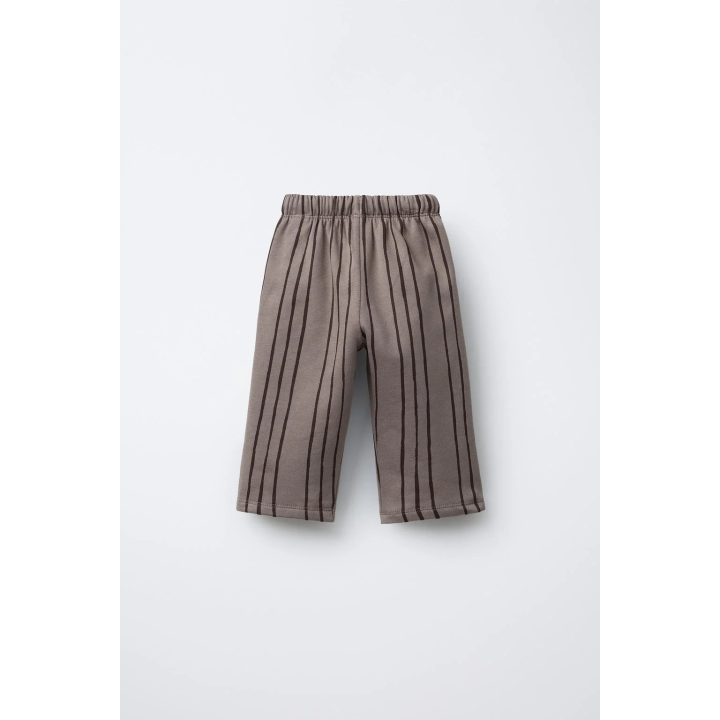 БРЮКИ В ПОЛОСКУ С НАШИВКОЙ