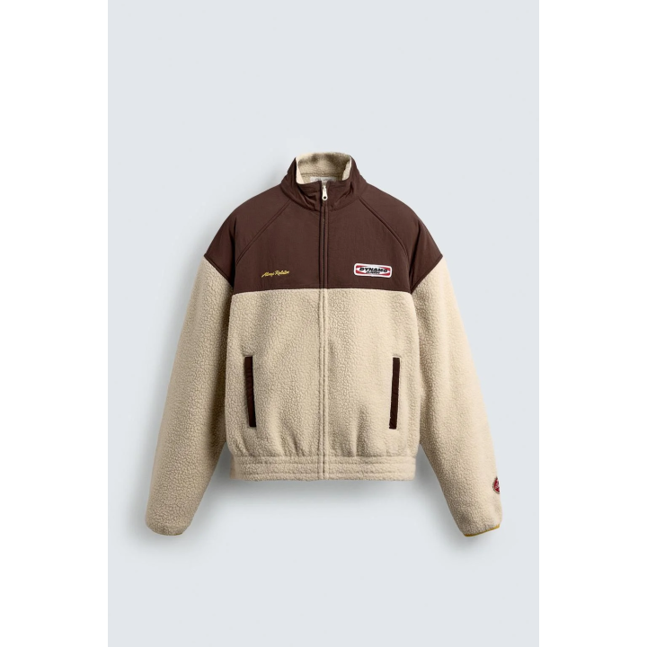 КУРТКА ИЗ ИСКУССТВЕННОЙ ОВЧИНЫ С КОНТРАСТНЫМИ ВСТАВКАМИ