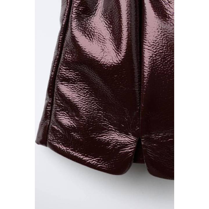 ЮБКА-ШОРТЫ ИЗ ЛАКОВОЙ КОЖИ С БАНТОМ