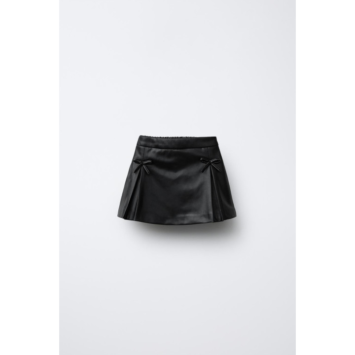 ЮБКА-БРЮКИ ИЗ ИСКУССТВЕННОЙ КОЖИ С БАНТАМИ