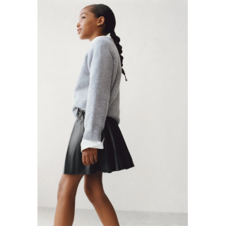 ЮБКА В СКЛАДКУ ИЗ ИСКУССТВЕННОЙ КОЖИ С БАНТАМИ