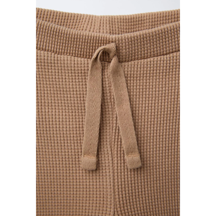 ЛЕГИНСЫ ИЗ РИФЛЕНОГО ТРИКОТАЖА С КРУЖЕВОМ