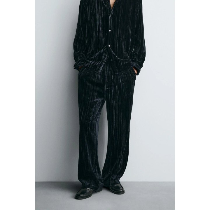 Брюки из вельвета с защипами