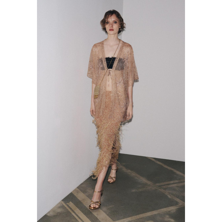 ЮБКА С ПАЙЕТКАМИ И ПЕРЬЯМИ