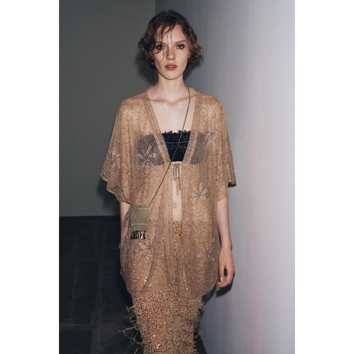 ЮБКА С ПАЙЕТКАМИ И ПЕРЬЯМИ