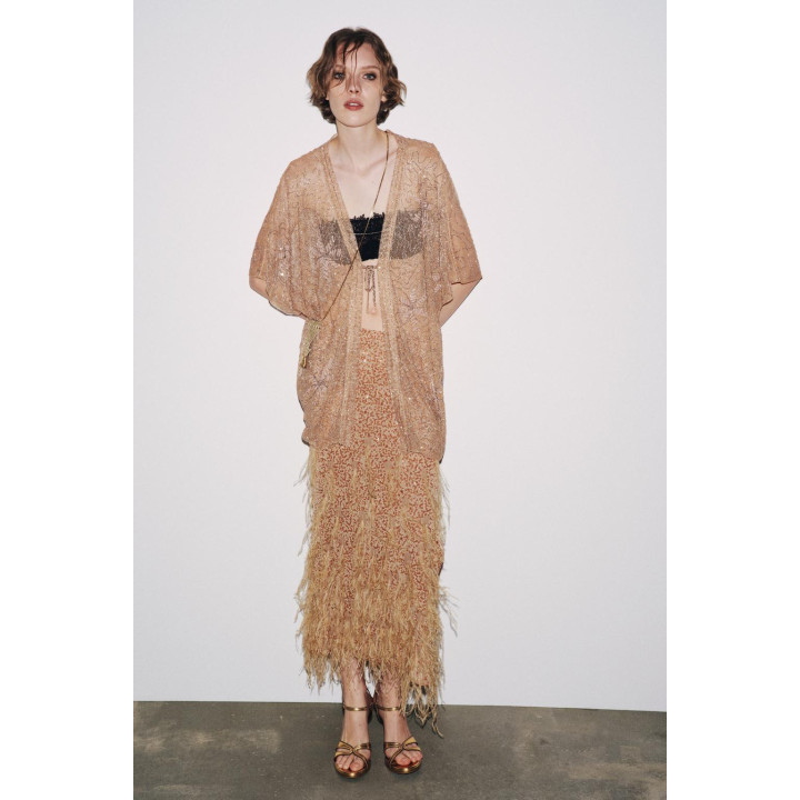 ЮБКА С ПАЙЕТКАМИ И ПЕРЬЯМИ