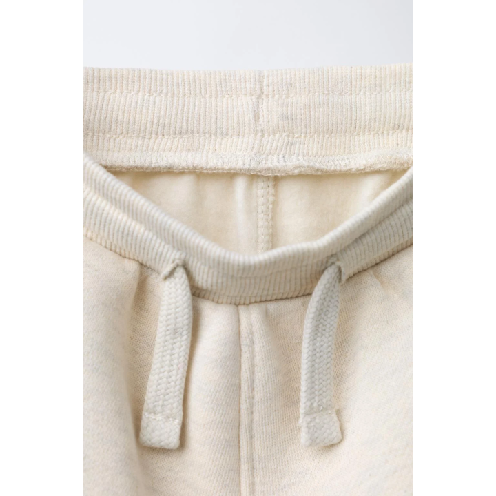 БРЮКИ-ДЖОГГЕРЫ С РЕЛЬЕФНЫМ ЛОГОТИПОМ