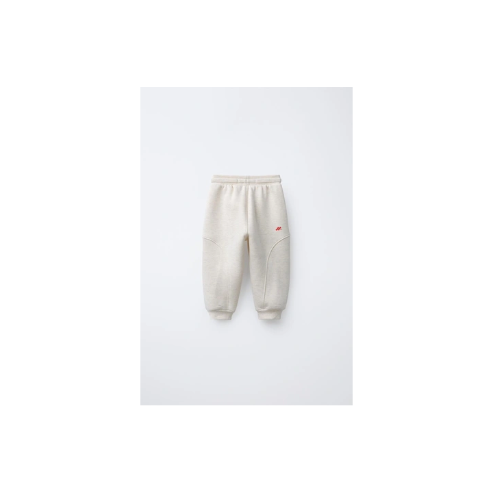 БРЮКИ-ДЖОГГЕРЫ С РЕЛЬЕФНЫМ ЛОГОТИПОМ