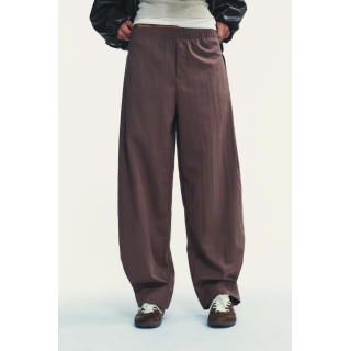 НЕЙЛОНОВЫЕ БРЮКИ С ПУГОВИЦАМИ СНИЗУ