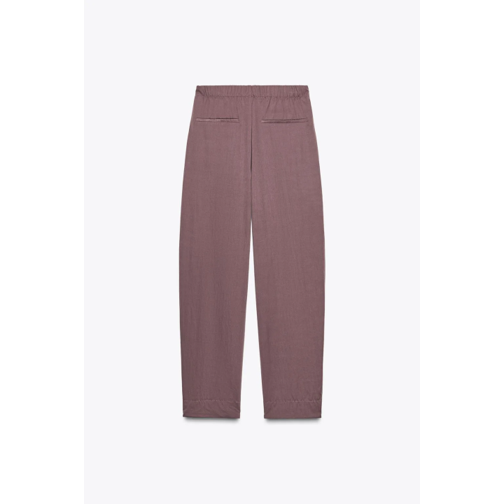 НЕЙЛОНОВЫЕ БРЮКИ С ПУГОВИЦАМИ СНИЗУ