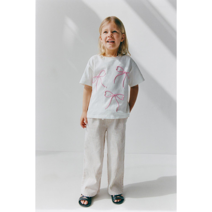 ФУТБОЛКА СО ШНУРОВКОЙ И БАНТАМИ