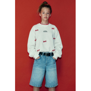 ТОЛСТОВКА С ТЕКСТОМ И БАНТИКАМИ