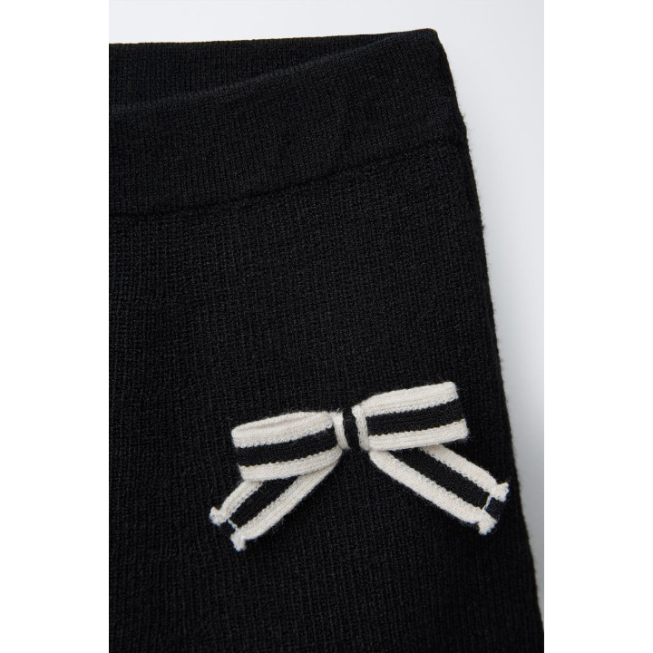 ТРИКОТАЖНАЯ ЮБКА С БАНТИКАМИ