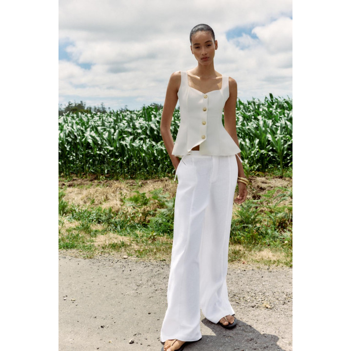 ЭЛАСТИЧНЫЙ ТОП-ЖИЛЕТ С БАСКОЙ