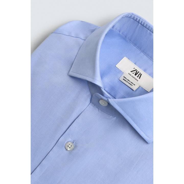 РУБАШКА ИЗ РЕЛЬЕФНОЙ ТКАНИ С МАНЖЕТАМИ ПОД ЗАПОНКИ