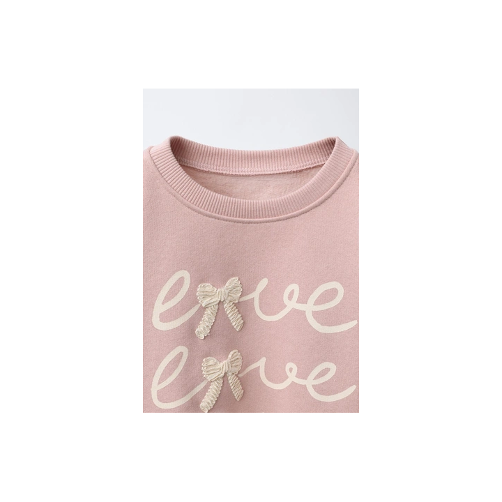 ТОЛСТОВКА С ВЫШИТЫМИ БАНТАМИ