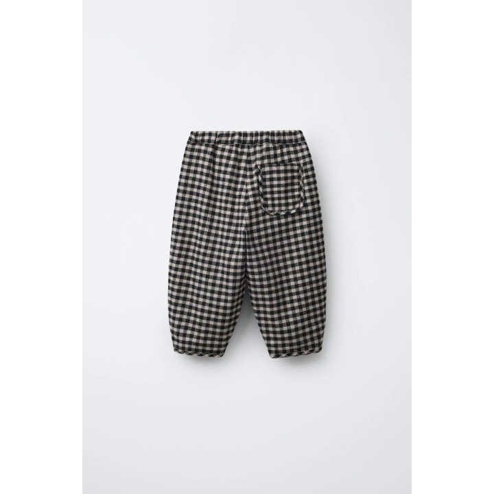 Брюки в клетку с объемным кроем