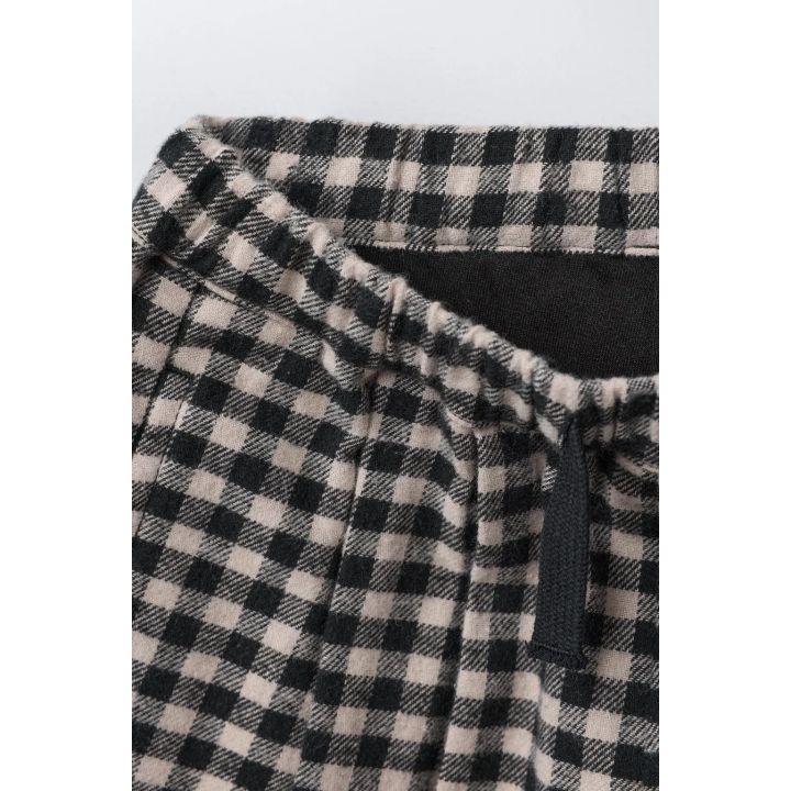 Брюки в клетку с объемным кроем