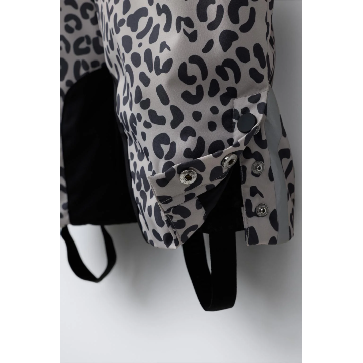 НЕПРОМОКАЕМЫЙ ВЕТРОЗАЩИТНЫЙ КОМБИНЕЗОН С АНИМАЛИСТИЧЕСКИМ ПРИНТОМ