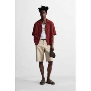 РУБАШКА С ЦВЕТОЧНЫМ РЕЛЬЕФОМ © OTIS KWAME KYE QUAICOE