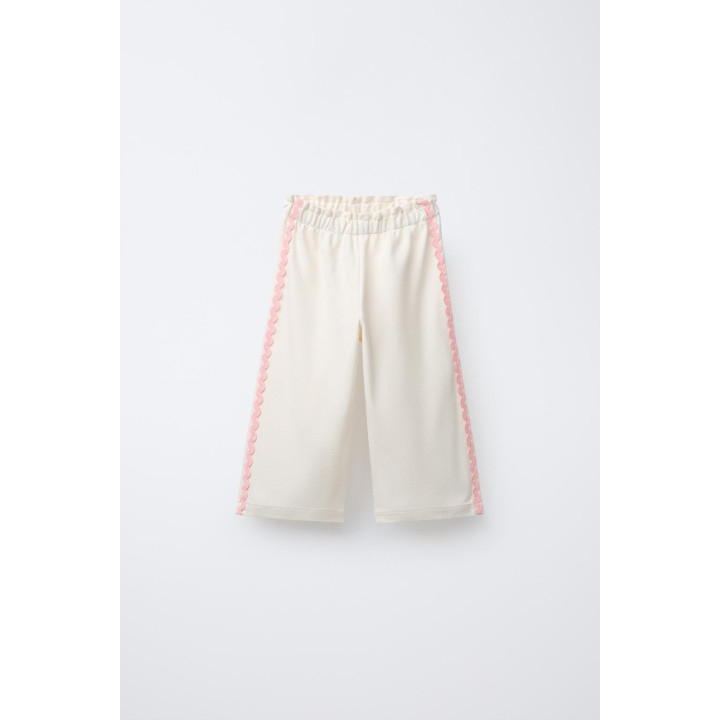 ПРЯМЫЕ БРЮКИ С ВОЛНИСТОЙ ОТДЕЛКОЙ