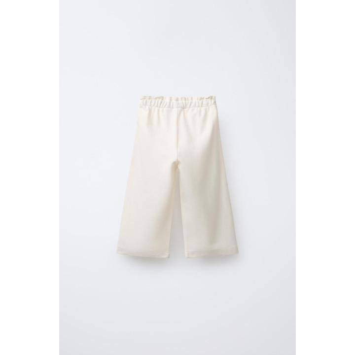 ПРЯМЫЕ БРЮКИ С ВОЛНИСТОЙ ОТДЕЛКОЙ