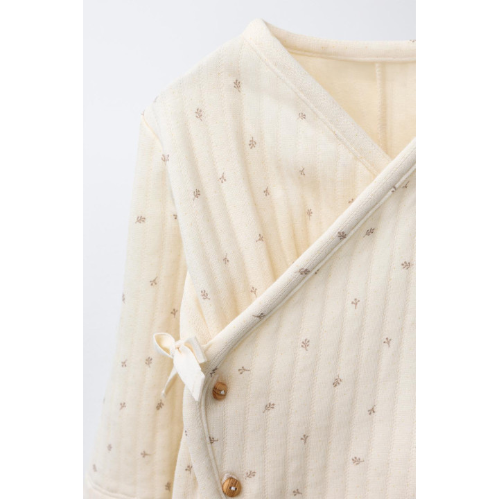 СТЕГАНЫЙ КОМБИНЕЗОН С ПРИНТОМ «ВЕТОЧКИ»