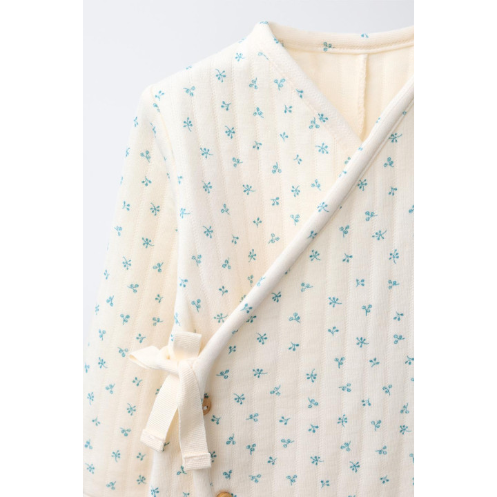 СТЕГАНЫЙ КОМБИНЕЗОН С ЦВЕТОЧНЫМ ПРИНТОМ