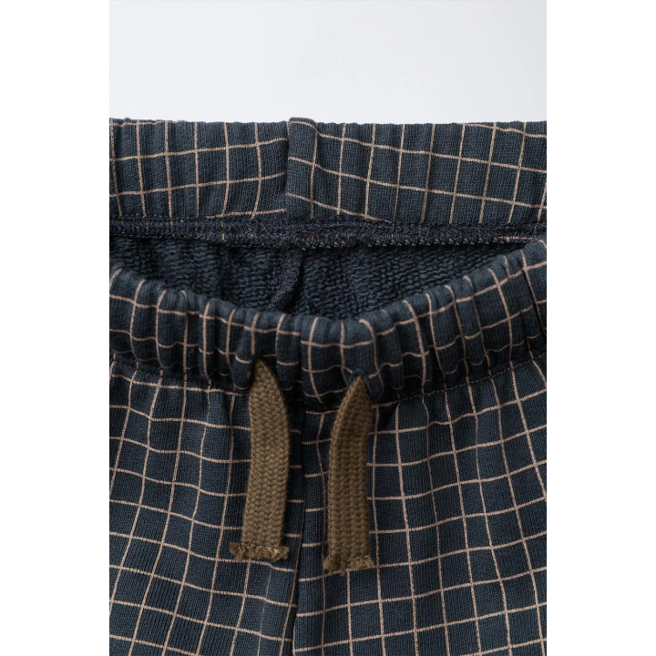 БРЮКИ СВОБОДНОГО КРОЯ В КЛЕТКУ