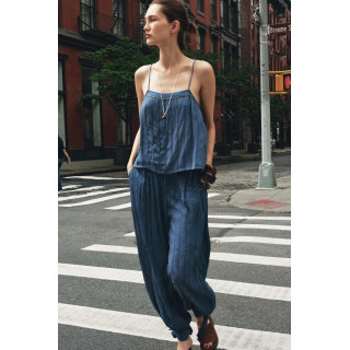 Брюки с бисером и завязками на подворотах