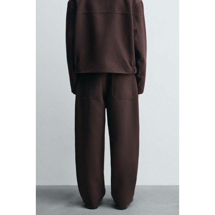 Брюки с завышенной талией и манжетами на резинке