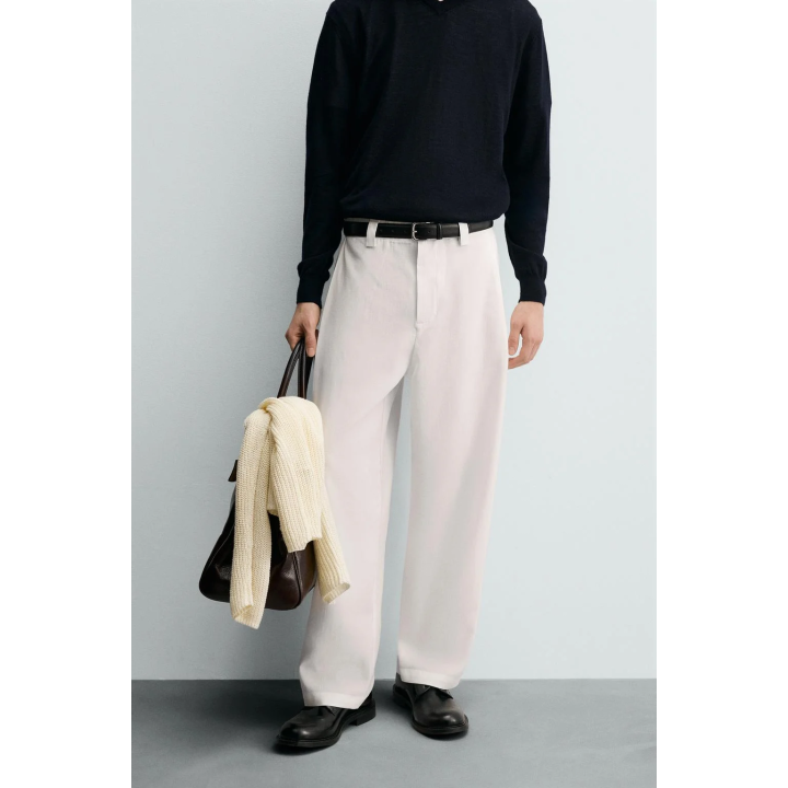 БРЮКИ ИЗ СТРУЯЩЕЙСЯ ТКАНИ СО СКЛАДКАМИ ПО БОКАМ