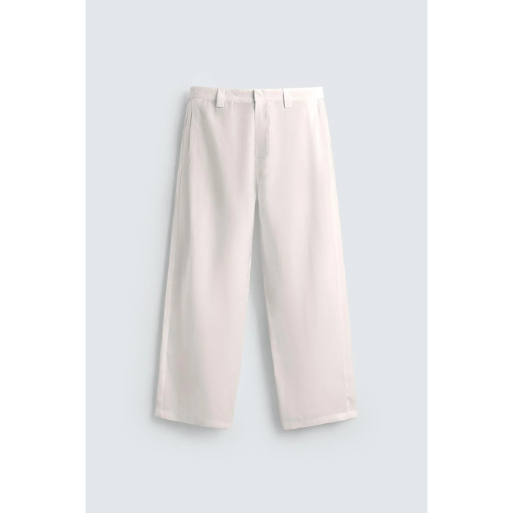 БРЮКИ ИЗ СТРУЯЩЕЙСЯ ТКАНИ СО СКЛАДКАМИ ПО БОКАМ